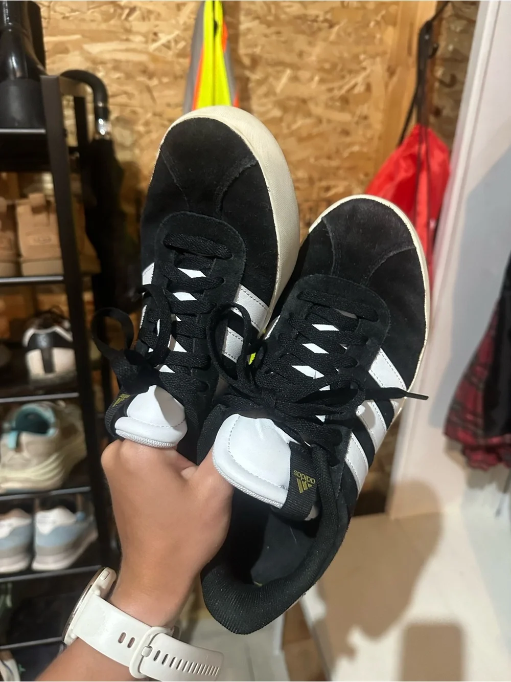 Women’s black adidas sneakers